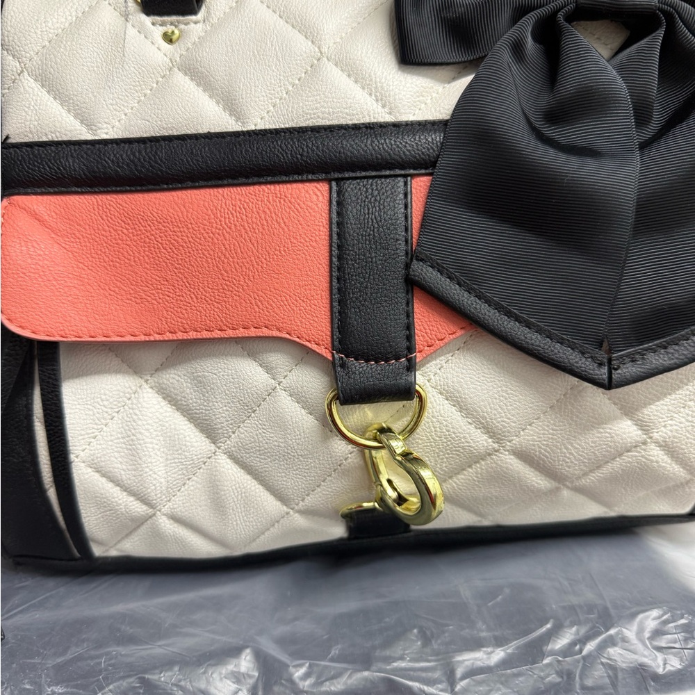 Betsy Johnson Elegant Black and White Quilted Handbag with Coral Accent